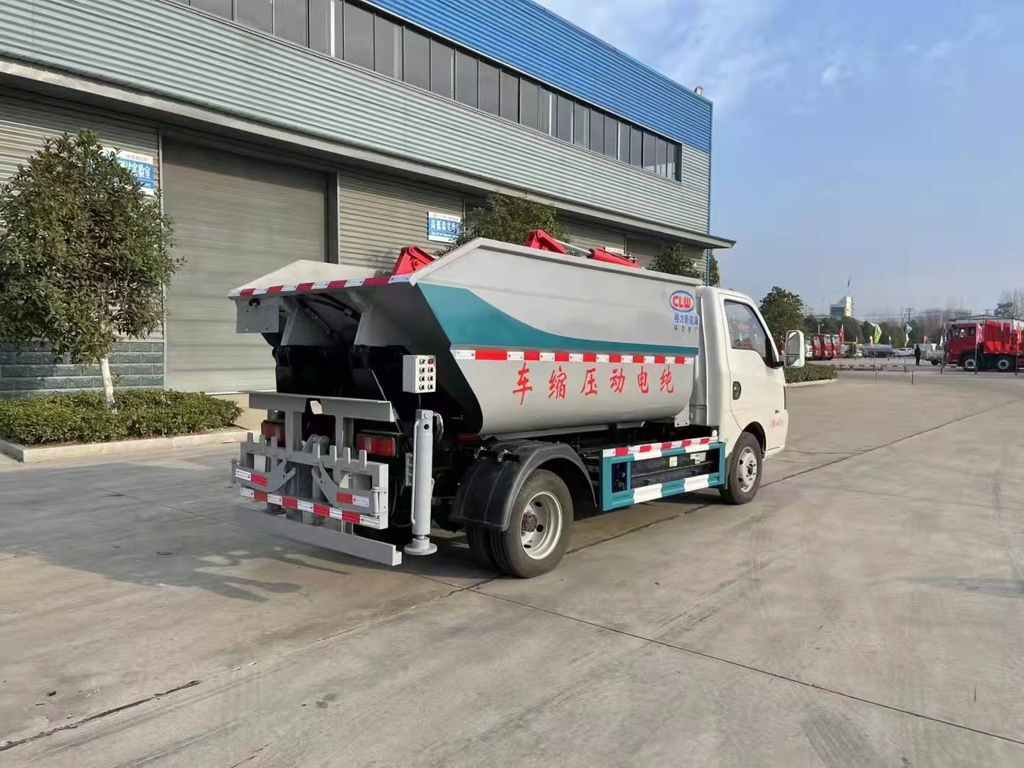 東風(fēng)華神純電動(dòng)自裝卸垃圾車(chē)